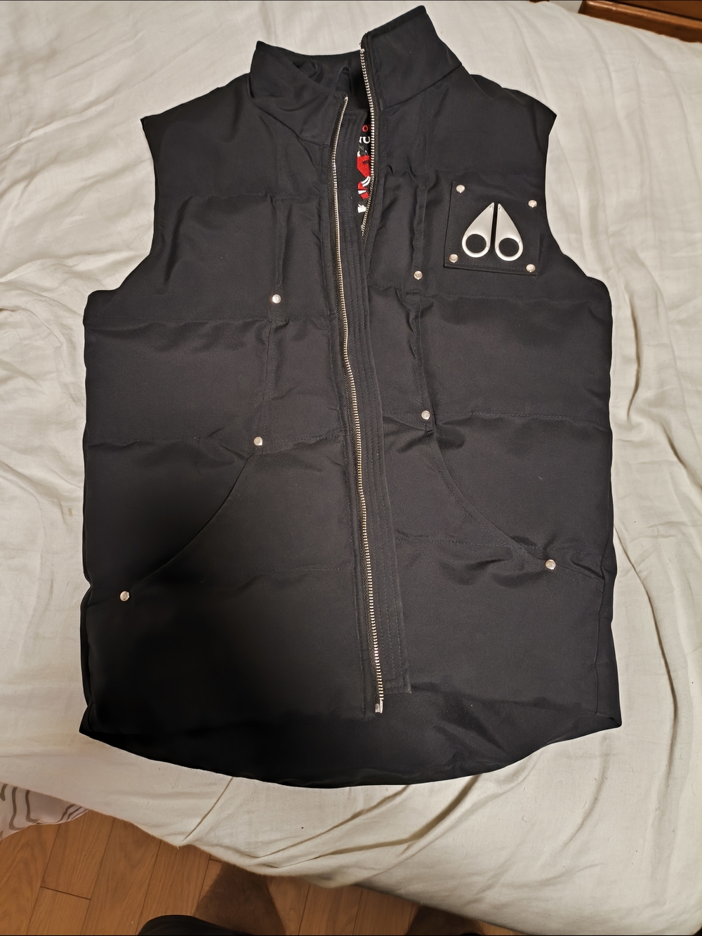 Moose Knuckles Black Jacket with Red and White Embroidered Patch